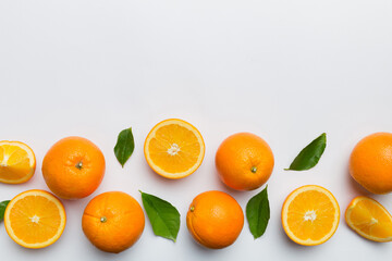 fresh Fruit orange slices on colored background. Top view. Copy Space. creative summer concept. Half of citrus in minimal flat lay with copy space