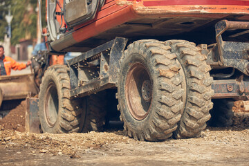 Obraz premium Public city street reconstrunction with heavy machines.