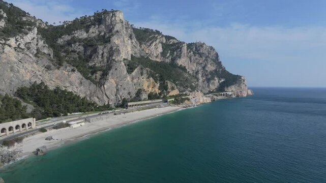 natural cliffs near the beaches and highway near Spiaggia del Malpasso on the road to Southern France from Italy