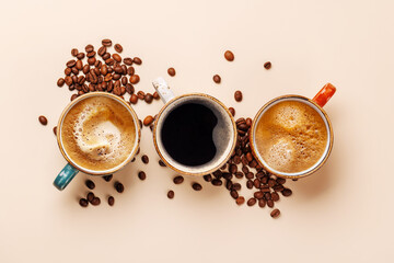 A steaming cups of freshly brewed coffee surrounded by rich, aromatic roasted coffee beans