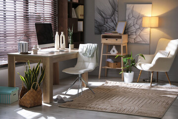 Comfortable workplace with computer in home office