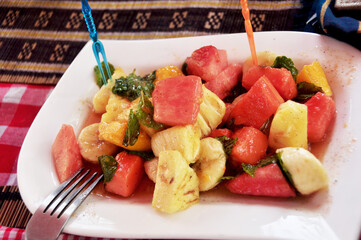 Fresh fruits salad burma style serve on ceramic plate for sale burmese people and foreign travelers in Bagan or Bagan ancient city in Mandalay Region of Myanmar