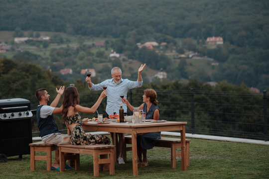 Family spending time together during spring family barbecue.