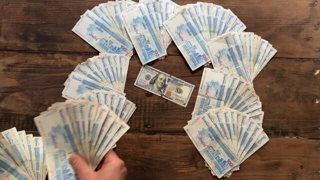 USD bill banknote Iran currency 100 compare Rial banknote Persian economic financial value inflation crisis bank business cash dollar economy finance investment money profit savings success wealth