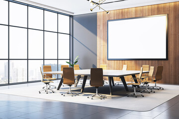 Modern corporate meeting room interior with blank poster frame on wooden wall and panoramic city...