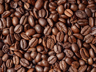 Fragrant freshly roasted coffee beans close-up