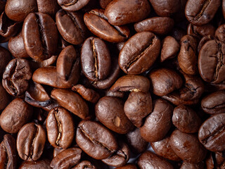 Fragrant freshly roasted coffee beans close-up