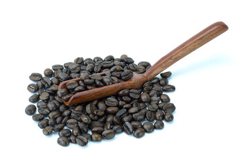 coffee beans in a wooden spoon, Heap of raw roasted coffee beans and in wooden scoop isolated on white background close up stack