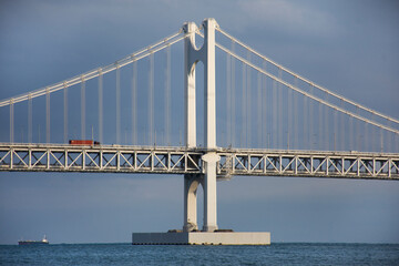 Gwangandaegyo suspension bridge or Diamond bridge and landscape sea ocean for korean people travelers travel visit at Gwangalli and Gwangan sand beach park at Suyeong gu city in Busan, South Korea