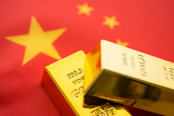 Two gold bars with Chinese flag background. Central bank of the republic of China keeps gold...