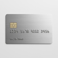 A sleek, minimalist credit card crafted from brushed metal on a white background. A brushed metal minimalist credit card stands out with its simple white presentation.