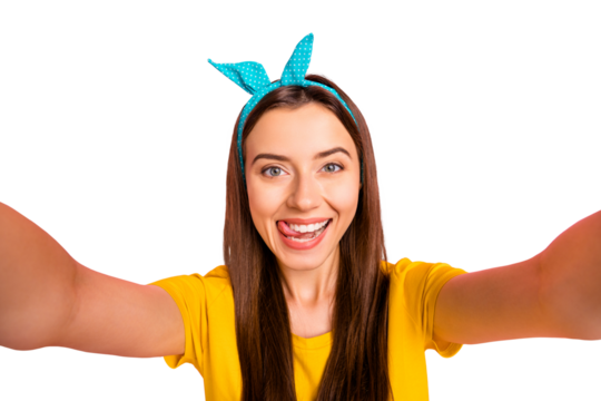 Close up photo of cheerful lady making photos wearing yellow t-shirt isolated over pink background