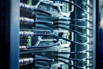 Close up of a data center and processing unit with cables and processors. Concept of hardware and...