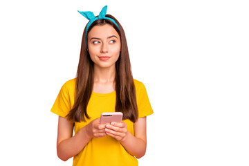 Portrait of dreamy youth with blue headband hold modern technology have thoughts wear yellow...