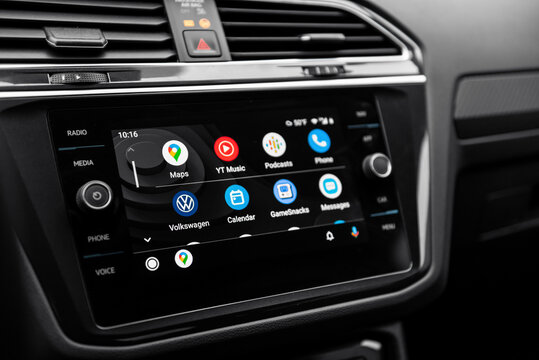 Android auto main screen menu in modern car. Close-up shot of infotainment system in Volkswagen car interior. Kyiv, Ukraine - September 20 2021.