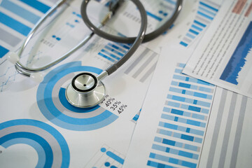Medical insurance business doctor analyzing medical report Health insurance business virtual graph...