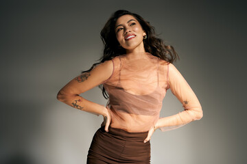 Joyful moments captured with a young beautiful woman radiating summer vibes in modern attire