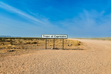 Namibia. Driving on a dirt road, crossing the Tropic of Capricorn