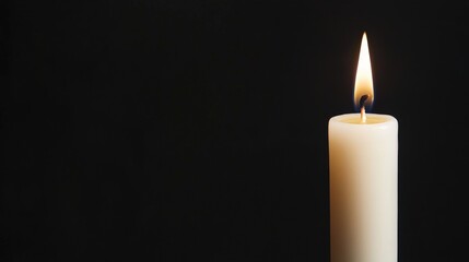 Expressing Deep Sadness and Hopeless Emotions, A lit candle glowing softly against a dark background.