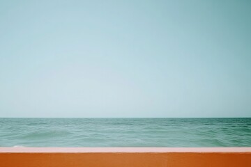 Fototapeta premium Serene ocean view with vivid orange foreground, blending tranqui