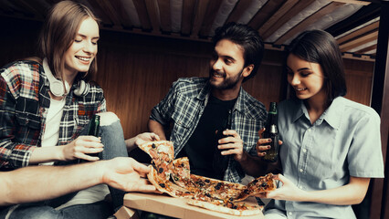 looking on girl and eating Pizza and drink
