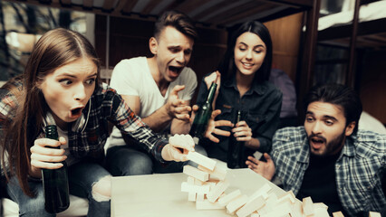 Girl spoiled everything playing in jenga.