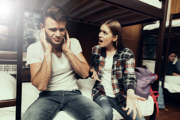 Woman screaming at Man and he covered his ears