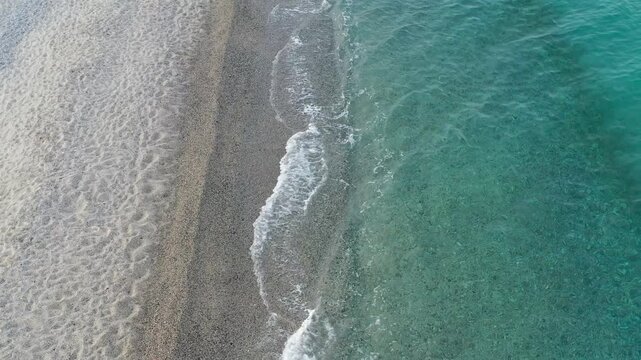 walking on the beach on a late summer day in Calabria, Soverato
