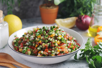 A bowl with traditional Israeli Salad