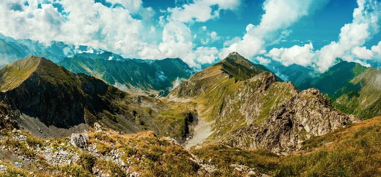 Majestic mountain range under vibrant sky