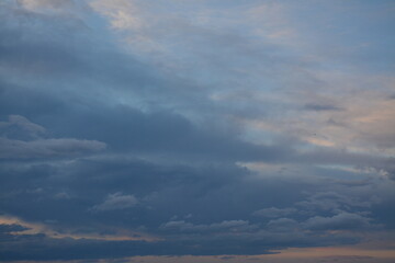 Evening beautiful sky in different clouds