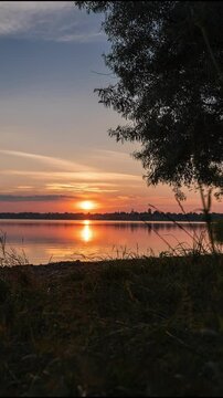 Beautiful calm lake with sunset