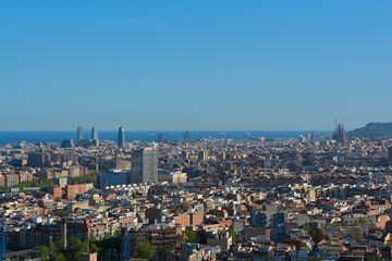 Barcelona City Skyline view with emblematics buildings: Torres Glories, Basílica de la Sagrada Familia, Montjuïc Castle and W Barcelona. Panoramic cityscape.