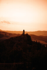 Fototapeta premium church in sunset in the mountains
