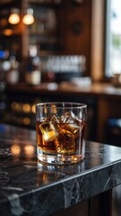 Elegant whiskey glass with ice resting on marble countertop in a cozy bar atmosphere during evening hours