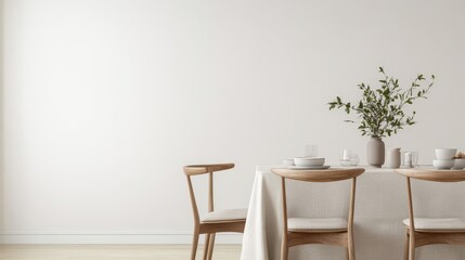 minimalist interior design  neutral tones  mindfulness Minimalist dining setup with a table, chairs, and a vase of flowers against a neutral wall.