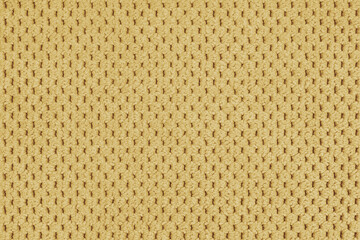 Plain yellow velour upholstery fabric, fleecy jacquard with macro, closr up pattern weave texture background, cloth textile surface. Wallpaper, backdrop with copy space