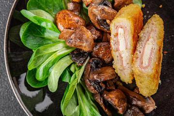 Cordon Bleu Cutlet meat chicken, ham, cheese appetizer dish fresh delicious gourmet food background on the table rustic food top view copy space