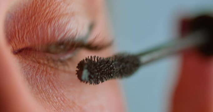 womens eyelashes  painting close-up beauty video in slow motion mode  | 4k