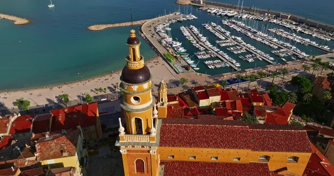 Establishing drone shot on old part of Menton, Provence. Tourist attraction, travel guide and sights of city breaks. Travelling, landmarks. Menton is a famous holiday destination in France
