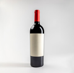 Mockup of classic bottle of red wine garnacha, on white background with copyspace, 750 ml, real photo