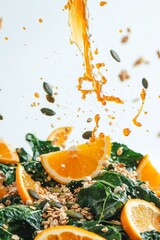 Chard salad with granola, orange slices and pumpkin seeds with citrus dressing splash