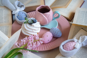 Easter 2025 table decoration for the holiday with flowers and accessories.
