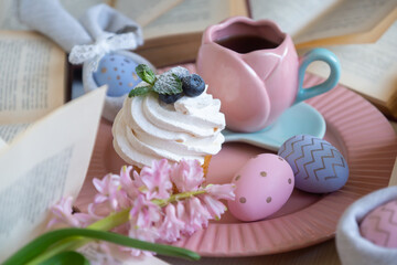 Easter 2025 table decoration for the holiday with flowers and accessories.