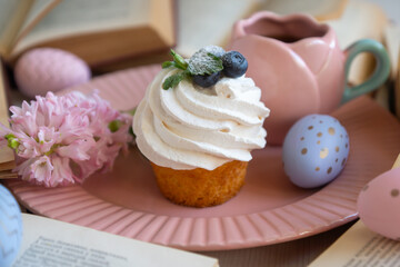 Easter 2025 table decoration for the holiday with flowers and accessories.