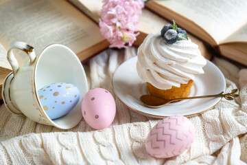 Easter 2025 table decoration for the holiday with flowers and accessories.