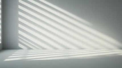 A minimalist interior showcasing diagonal light and shadow patterns on a smooth wall, ideal for contemporary design themes.
