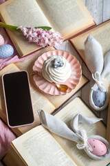 Easter 2025 table decoration for the holiday with flowers and accessories.