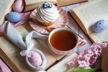 Easter 2025 table decoration for the holiday with flowers and accessories.