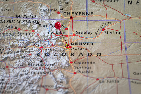 Colorful tourist location map with red stick pin at Denver, Colorado, USA and the surrounding area